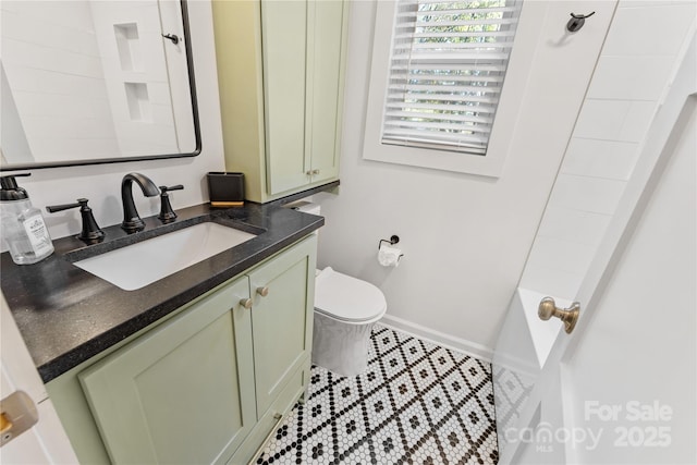 full bath with baseboards, toilet, a bathtub, walk in shower, and vanity