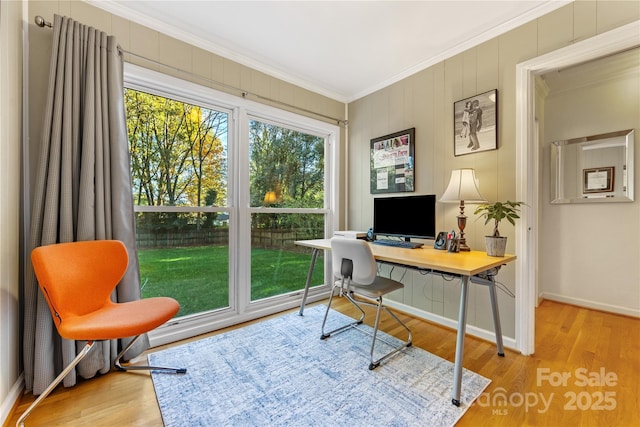 home office with baseboards, ornamental molding, and wood finished floors