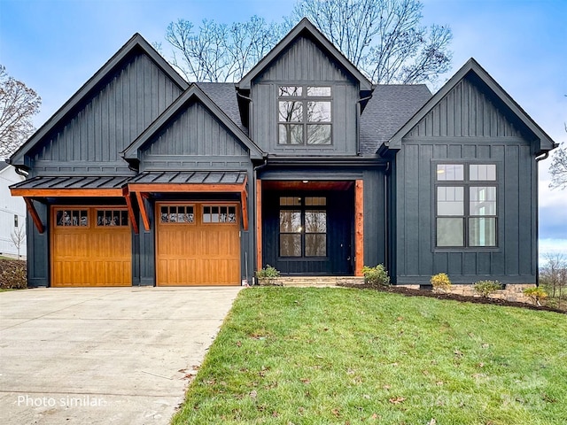 modern farmhouse style home featuring metal roof, roof with shingles, board and batten siding, a standing seam roof, and a front yard