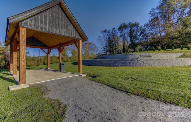 view of property's community featuring a gazebo and a lawn