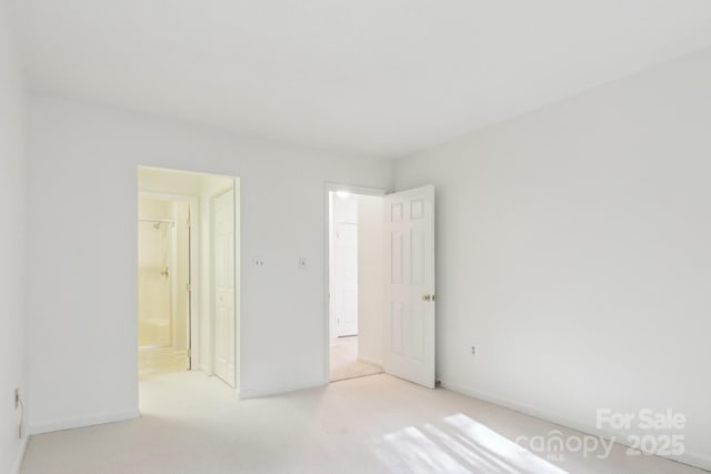 unfurnished bedroom featuring carpet