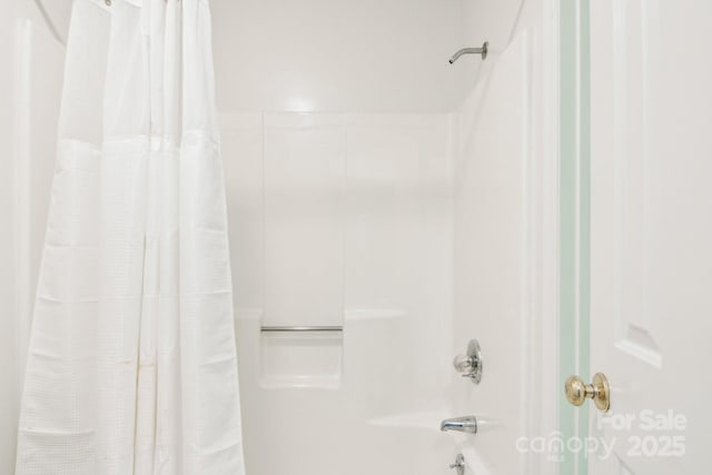 full bathroom with shower / bathtub combination with curtain