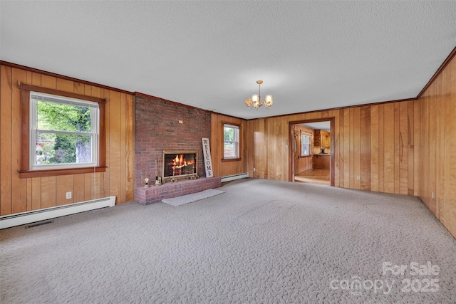 6285 NC-16 Hwy N, Taylorsville, NC 28681 - unfurnished living room with a baseboard radiator, a chandelier, carpet, wooden walls, and a textured ceiling