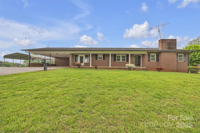 6285 NC-16 Hwy N, Taylorsville, NC 28681 - view of front of house featuring a front lawn, driveway, and a chimney