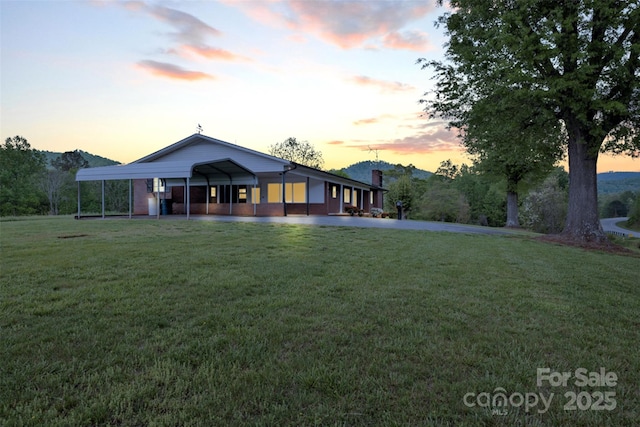 6285 NC-16 Hwy N, Taylorsville, NC 28681 - view of front facade with a front yard and a carport