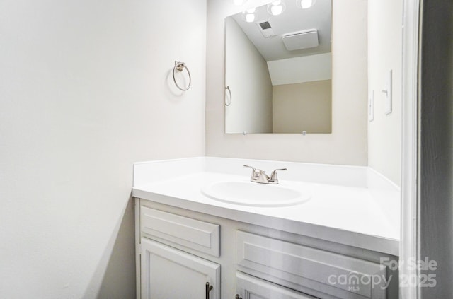 bathroom with visible vents and vanity