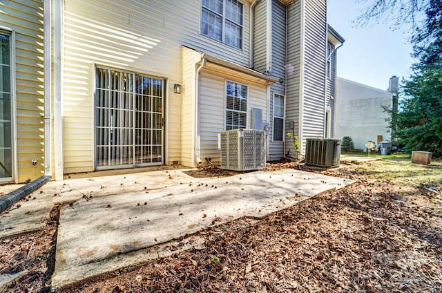 exterior space featuring central AC and a patio area