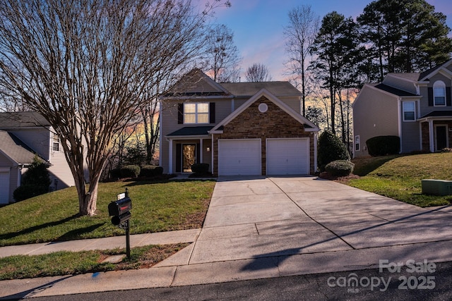 view of front facade with central AC unit, a lawn, driveway, and a garage