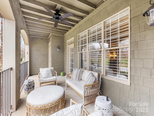 view of patio / terrace with an outdoor living space and a ceiling fan