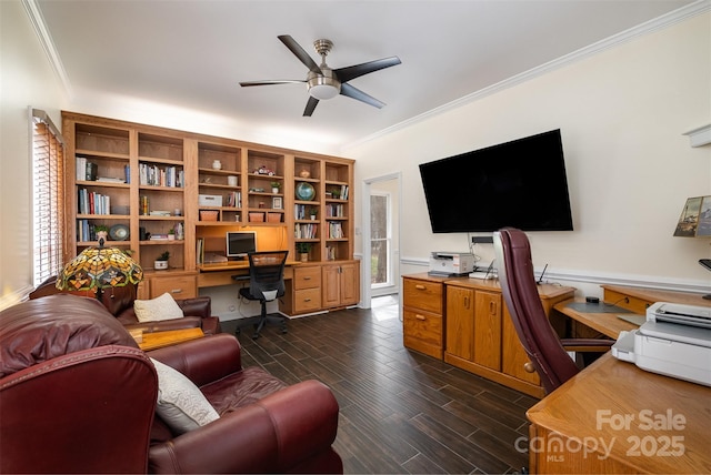 office space featuring crown molding, a ceiling fan, a wealth of natural light, and wood tiled floor