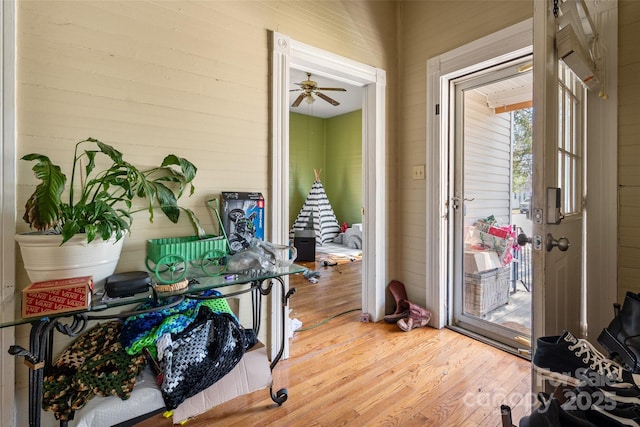 entryway with wood finished floors