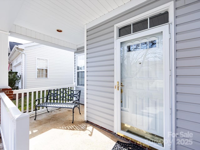 entrance to property with covered porch