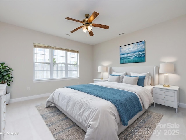 bedroom with visible vents, ceiling fan, and baseboards