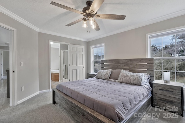 carpeted bedroom featuring ornamental molding, multiple windows, and baseboards