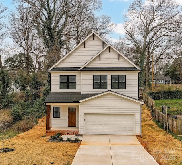 view of front facade featuring a garage, a front lawn, fence, a shingled roof, and driveway