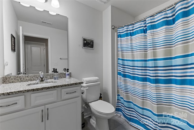 full bathroom with a shower with curtain, visible vents, toilet, vanity, and tile patterned flooring