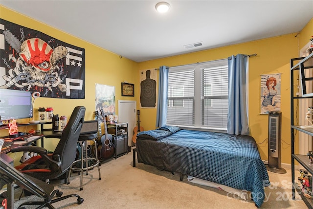 bedroom with carpet and visible vents