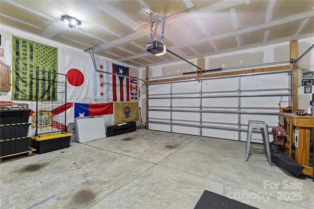 garage featuring a garage door opener