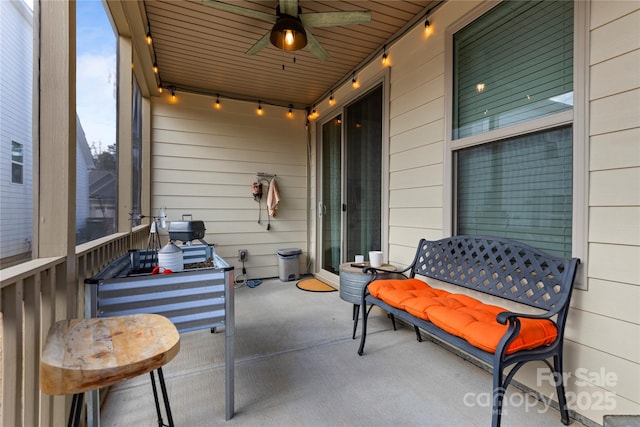 view of patio / terrace featuring ceiling fan