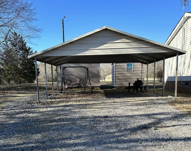 exterior space with a detached carport