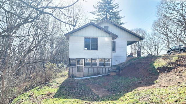 view of side of property with board and batten siding