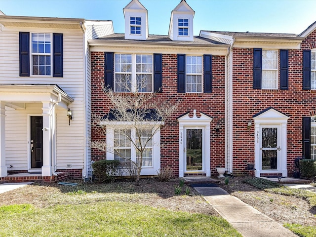 multi unit property featuring brick siding