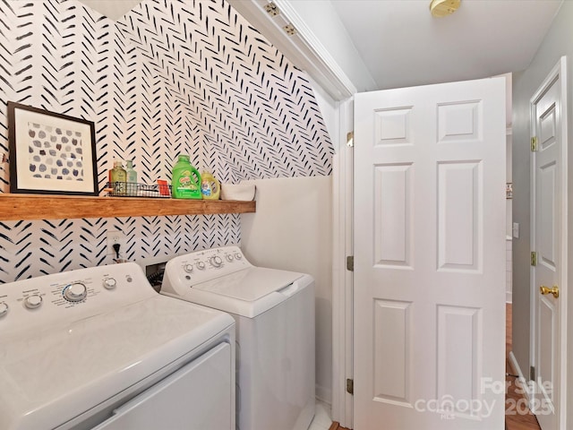 washroom featuring laundry area and independent washer and dryer