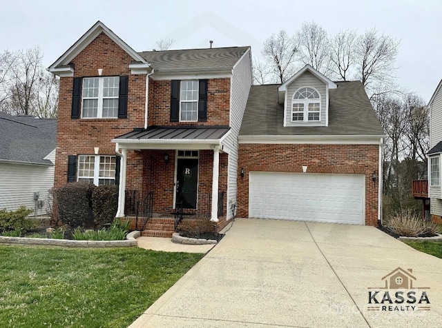 traditional-style home featuring brick siding, driveway, an attached garage, and a front lawn