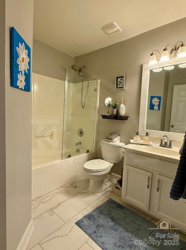 full bathroom featuring visible vents, toilet, marble finish floor, vanity, and shower / bathtub combination