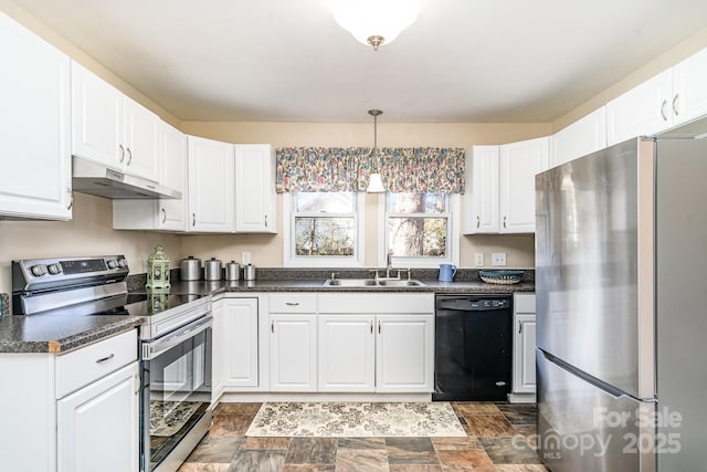 kitchen featuring dark countertops, under cabinet range hood, appliances with stainless steel finishes, white cabinets, and a sink