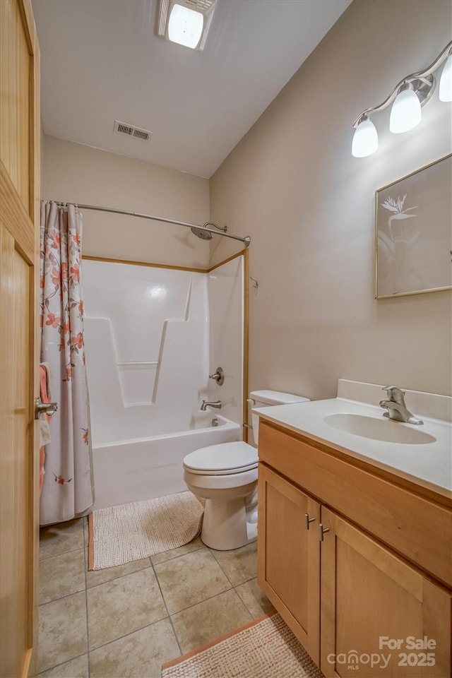 bathroom with shower / tub combo, visible vents, toilet, tile patterned floors, and vanity