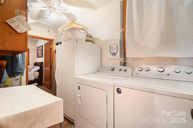 laundry room with laundry area and washing machine and clothes dryer