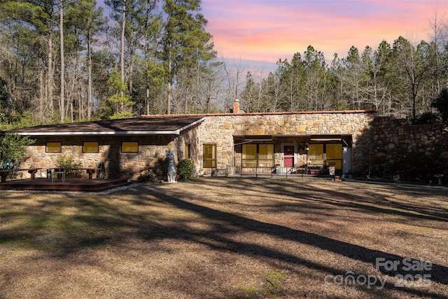 view of front facade with stone siding