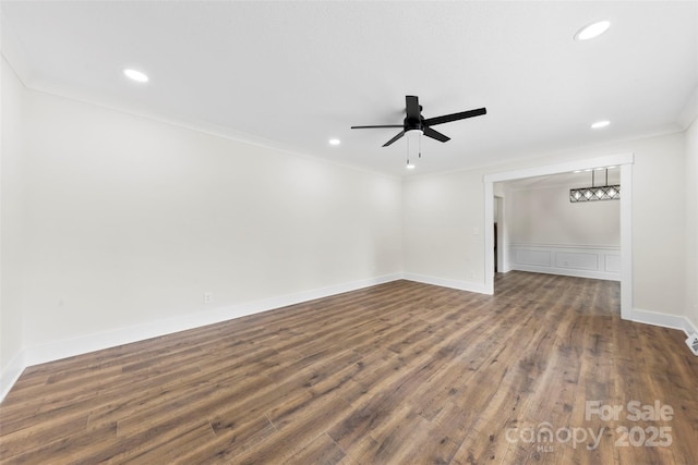 spare room featuring recessed lighting, wood finished floors, a ceiling fan, and crown molding