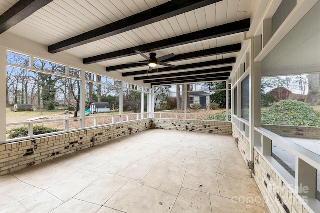 view of patio / terrace with a lanai and ceiling fan