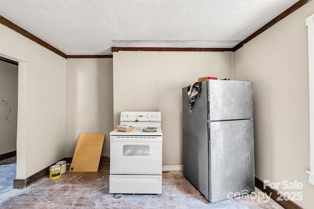 kitchen featuring freestanding refrigerator, crown molding, baseboards, and white range with electric cooktop