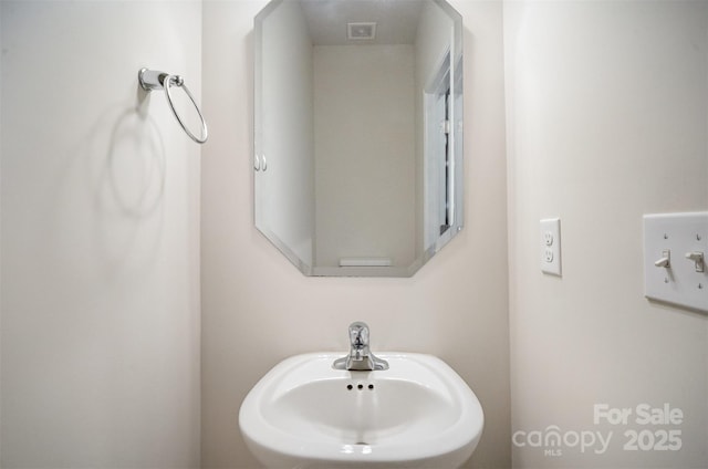 5532 Axil Ln, Charlotte, NC 28269 - bathroom featuring a sink