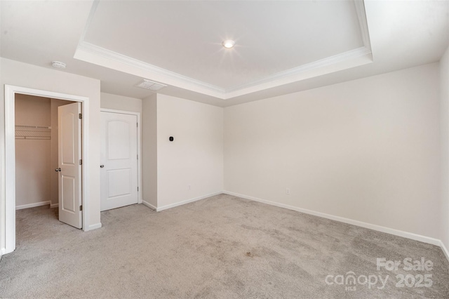 5532 Axil Ln, Charlotte, NC 28269 - unfurnished room featuring light carpet, a raised ceiling, and crown molding