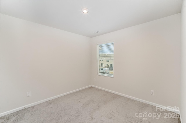 5532 Axil Ln, Charlotte, NC 28269 - empty room with baseboards and light colored carpet