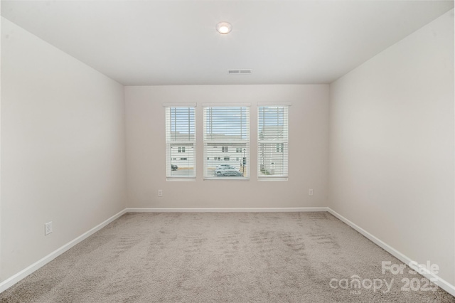 5532 Axil Ln, Charlotte, NC 28269 - unfurnished room featuring carpet and baseboards