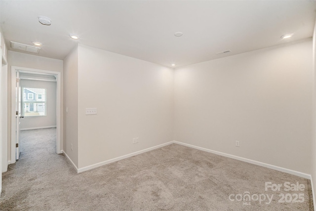 5532 Axil Ln, Charlotte, NC 28269 - carpeted spare room with visible vents, baseboards, and recessed lighting