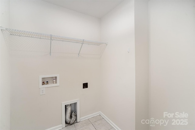 5532 Axil Ln, Charlotte, NC 28269 - clothes washing area featuring light tile patterned floors, laundry area, washer hookup, baseboards, and electric dryer hookup