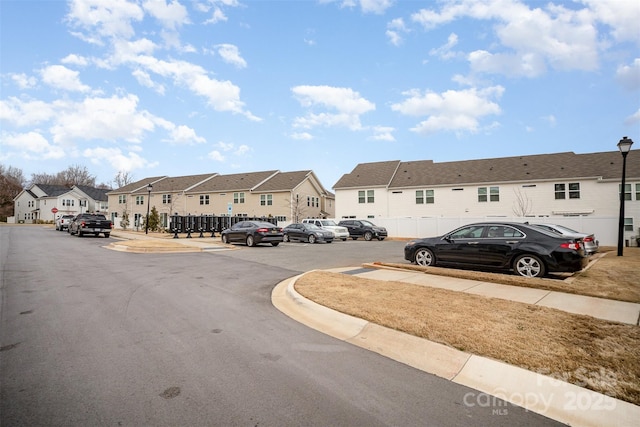5532 Axil Ln, Charlotte, NC 28269 - view of road featuring a residential view, curbs, sidewalks, and street lights