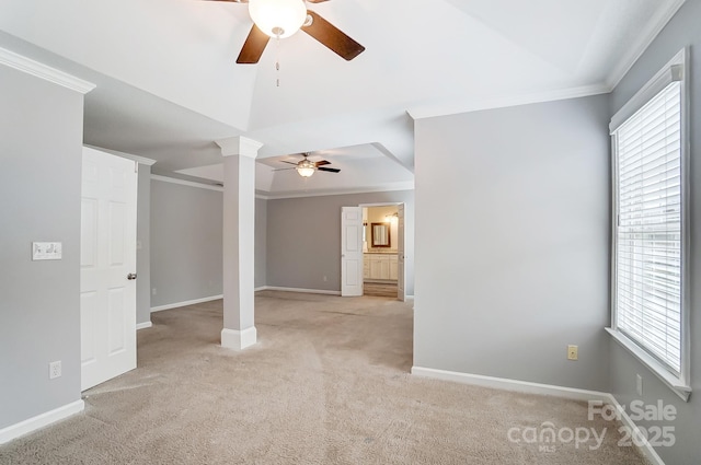 spare room featuring light carpet, baseboards, and ornamental molding