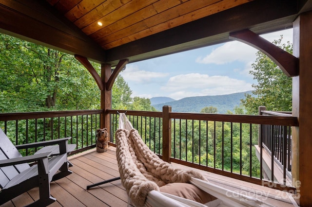 wooden terrace with a mountain view