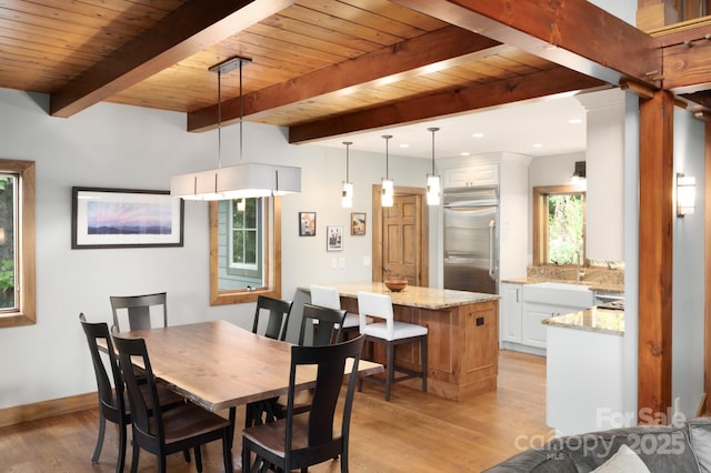 dining area with beam ceiling, recessed lighting, wooden ceiling, light wood finished floors, and baseboards