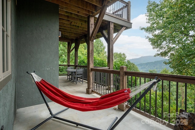 view of patio / terrace featuring a mountain view