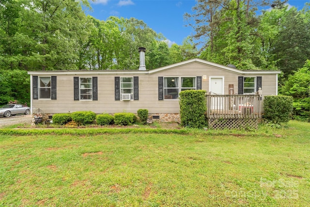 manufactured / mobile home with crawl space, cooling unit, and a front lawn