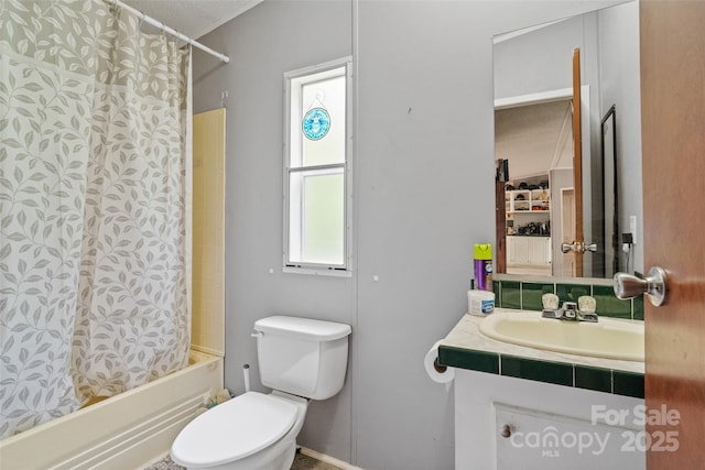 full bathroom with toilet, baseboards, shower / bath combination with curtain, and vanity