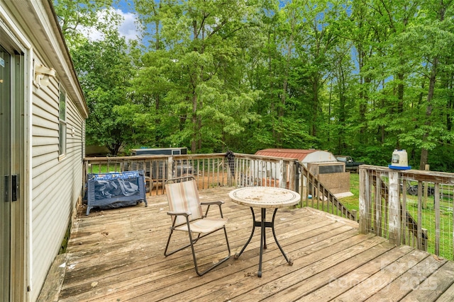 deck with an outbuilding